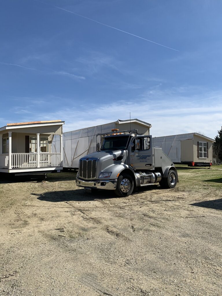 Semi truck transporting a mobile home